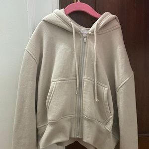 cropped beige zip up